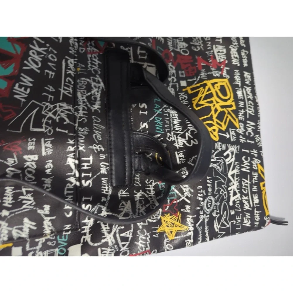 DKNY Tilly Graffiti Fold Over Backpack Purse Top Handle Zip Adjustable